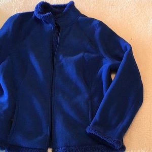 Blue Fleece zip up jacket with pockets.